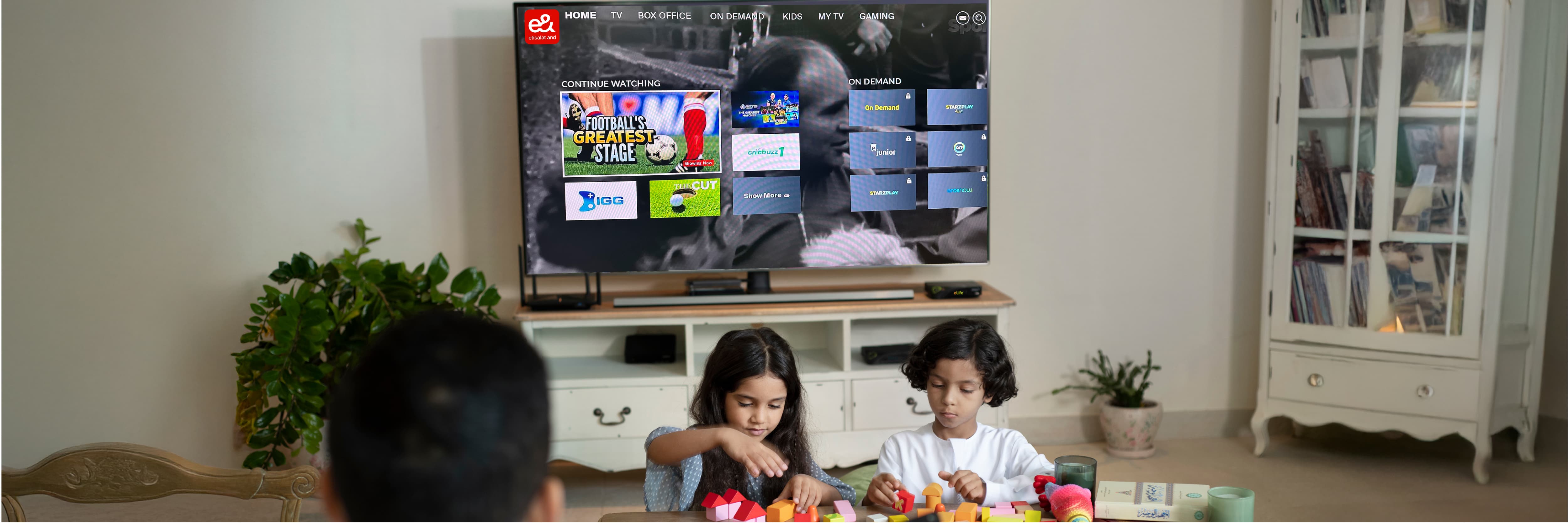 Happy family enjoying Etisalat services